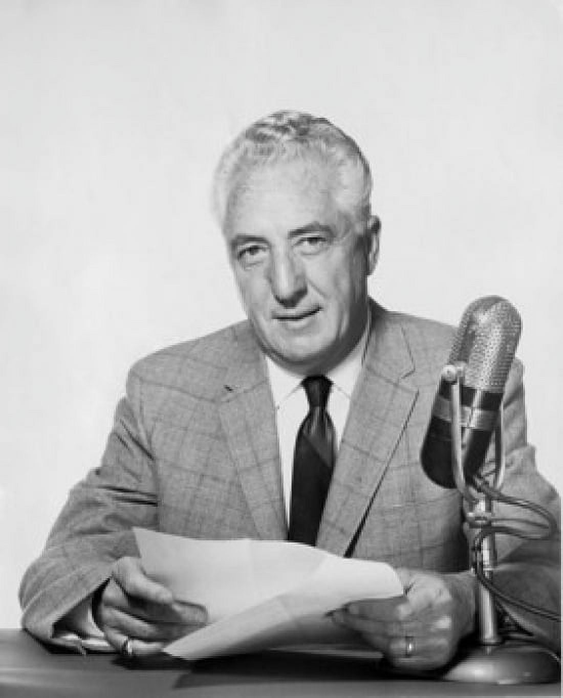 Portrait of mid adult man reading report into microphone Canvas Art - (24 x 36)
