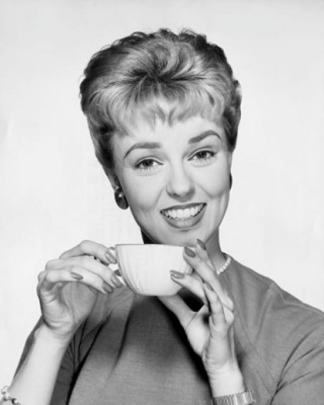 Portrait of mid adult woman holding tea cup Canvas Art - (24 x 36)