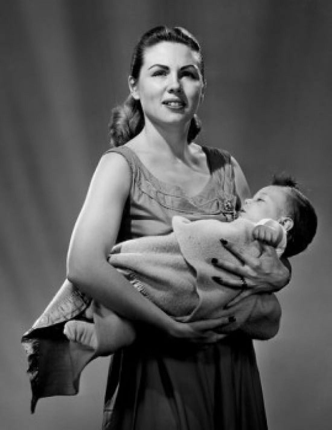 Portrait of mother carrying baby wrapped in blanket Canvas Art - (24 x 36)