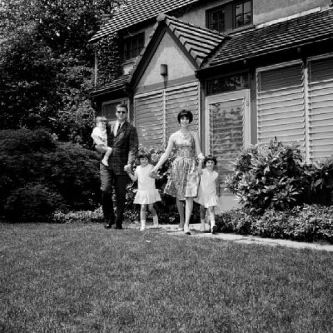 Portrait of parents with daughters in garden Canvas Art - (24 x 36)