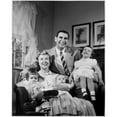 thumbnail image 1 of Portrait of parents with three children sitting in living room Poster Print (18 x 24), 1 of 4