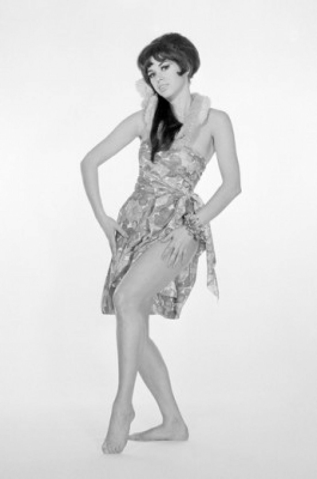 Portrait of pin-up girl pulling up dress Canvas Art - (18 x 24)