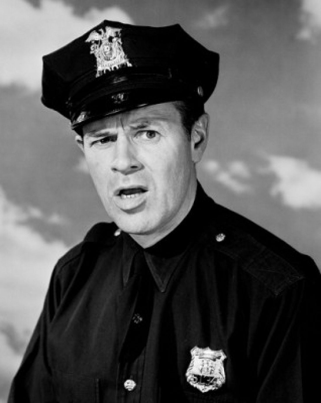 Portrait of police officer frowning Canvas Art - (18 x 24)