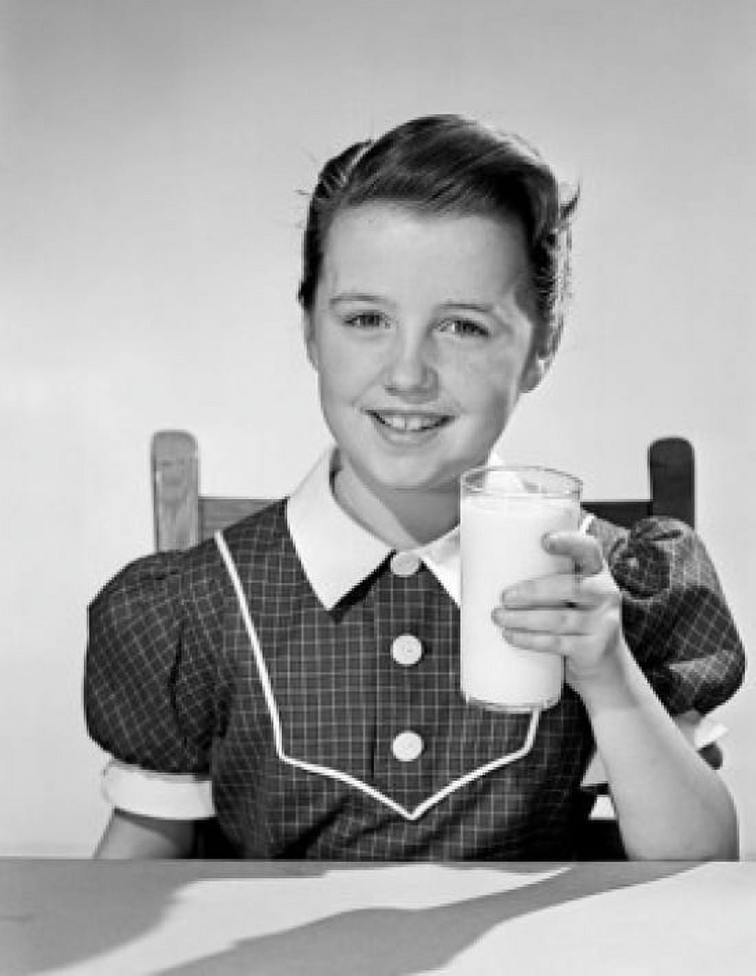 Portrait of school girl drinking milk Canvas Art - (18 x 24)
