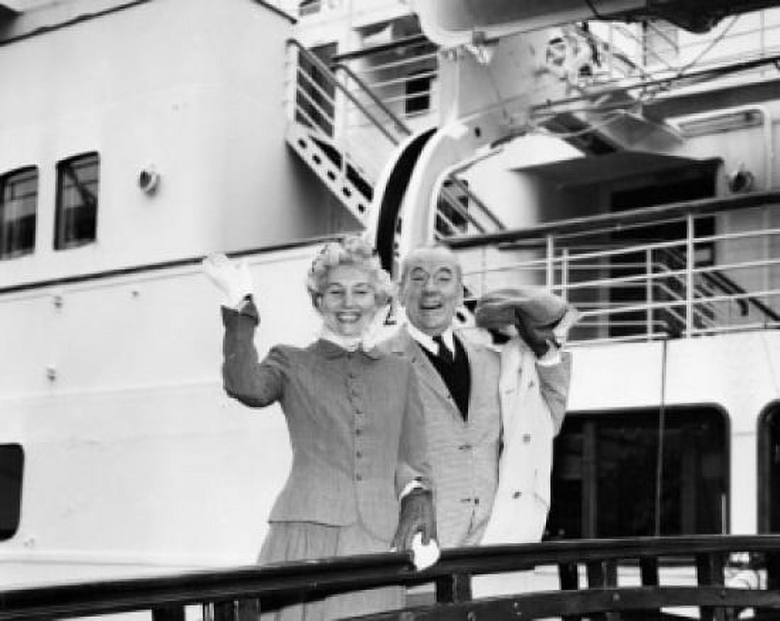 Portrait of senior couple waving from cruise ship Canvas Art - (24 x 36)