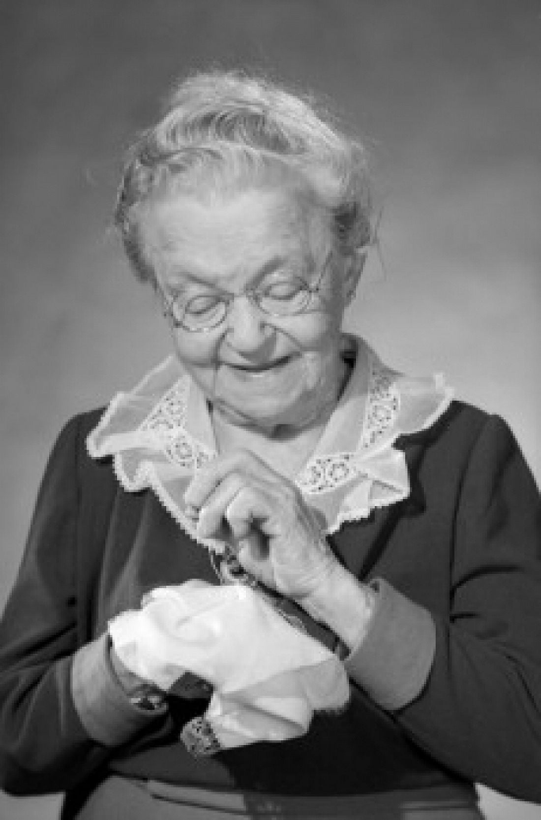 Portrait of sewing old woman Canvas Art - (24 x 36)