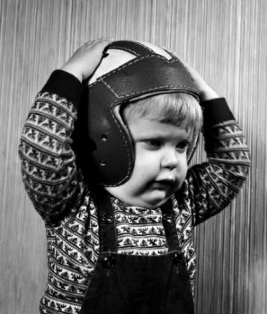 Portrait of small boy wearing baseball helmet Canvas Art -  (18 x 24)