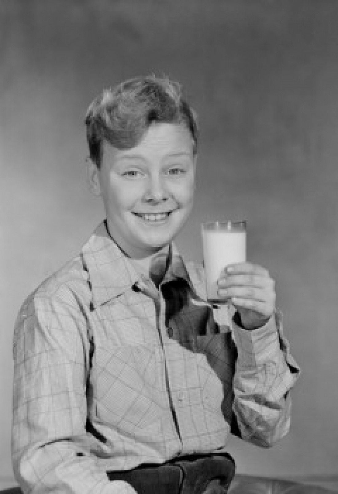 Portrait of smiling boy with glass of milk Canvas Art - (24 x 36)