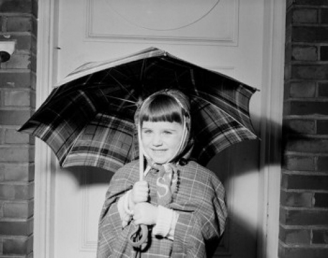 Portrait of smiling girl with umbrella Canvas Art - (24 x 36)