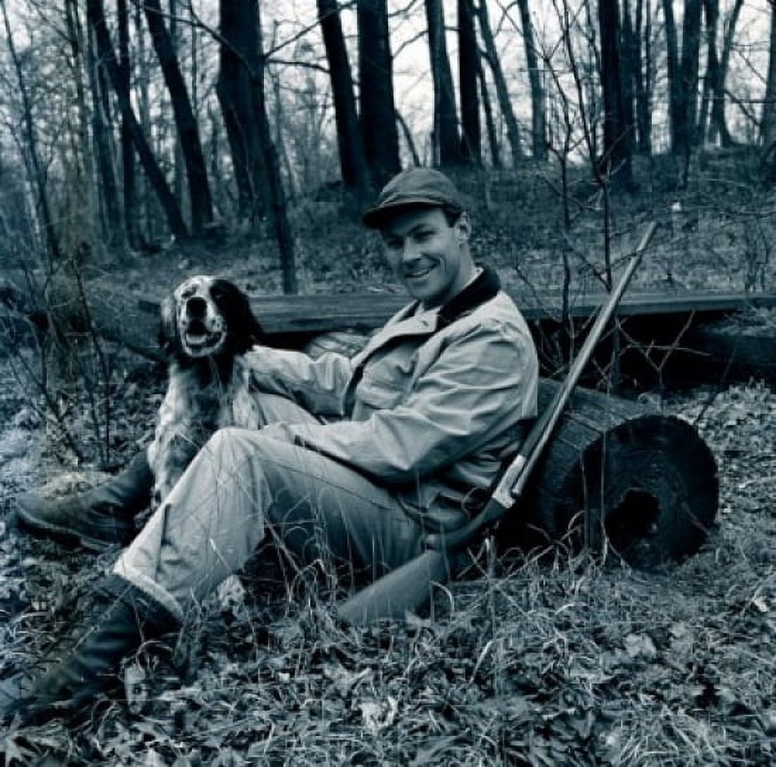 Portrait of smiling hunter with English Setter in forest Canvas Art - (24 x 36)