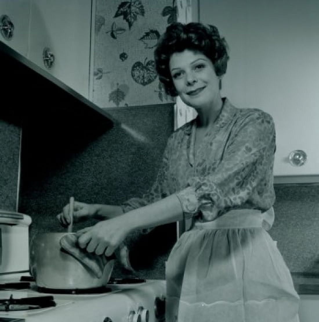 Portrait of smiling woman cooking Canvas Art - (24 x 36)