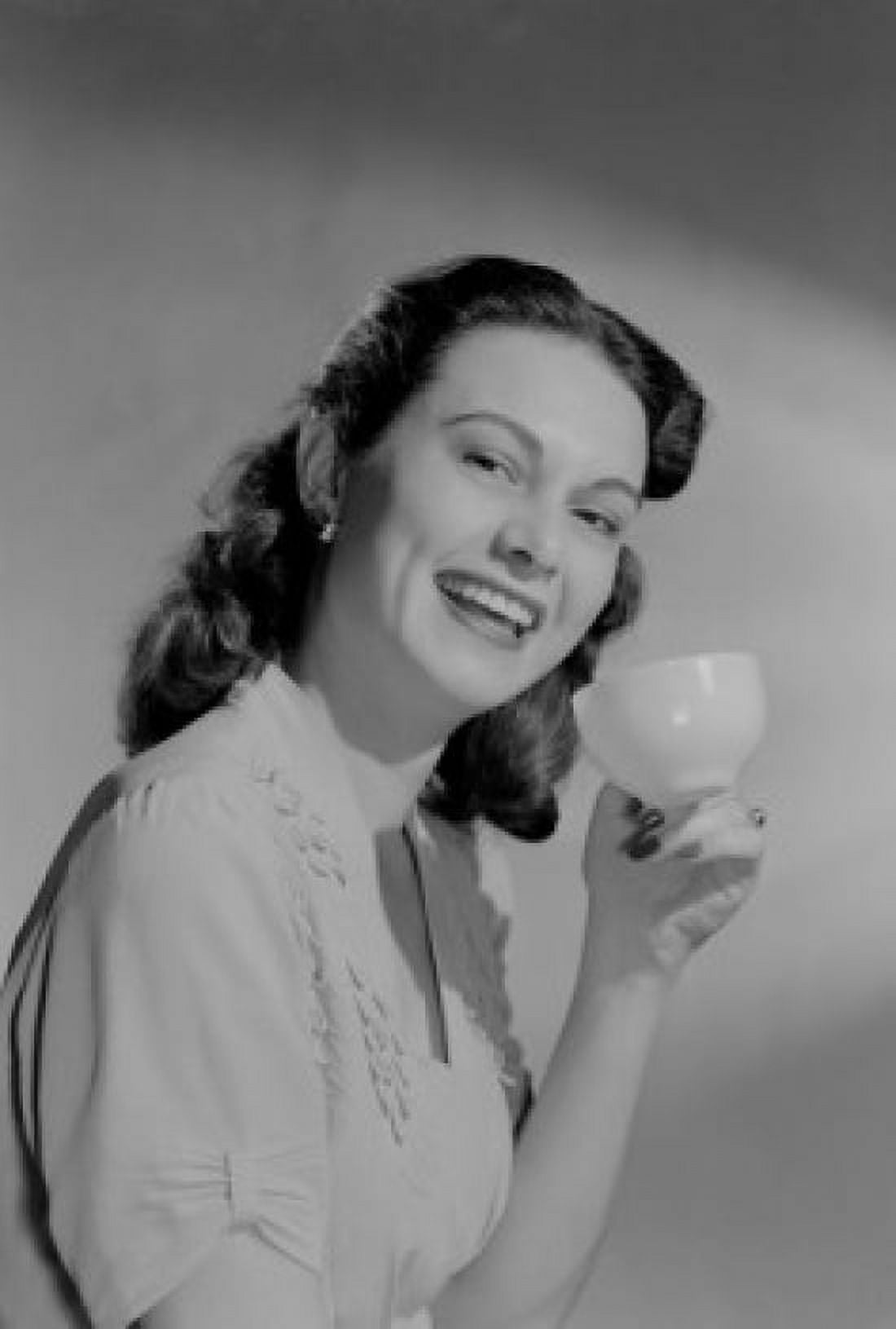 Portrait of smiling woman holding coffee cup Canvas Art - (24 x 36)