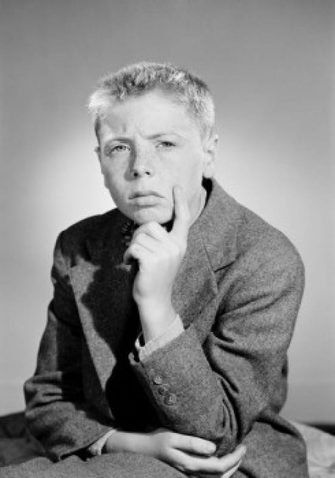 Portrait of thoughtful boy wearing suit and looking away studio shot Canvas Art - (24 x 36)