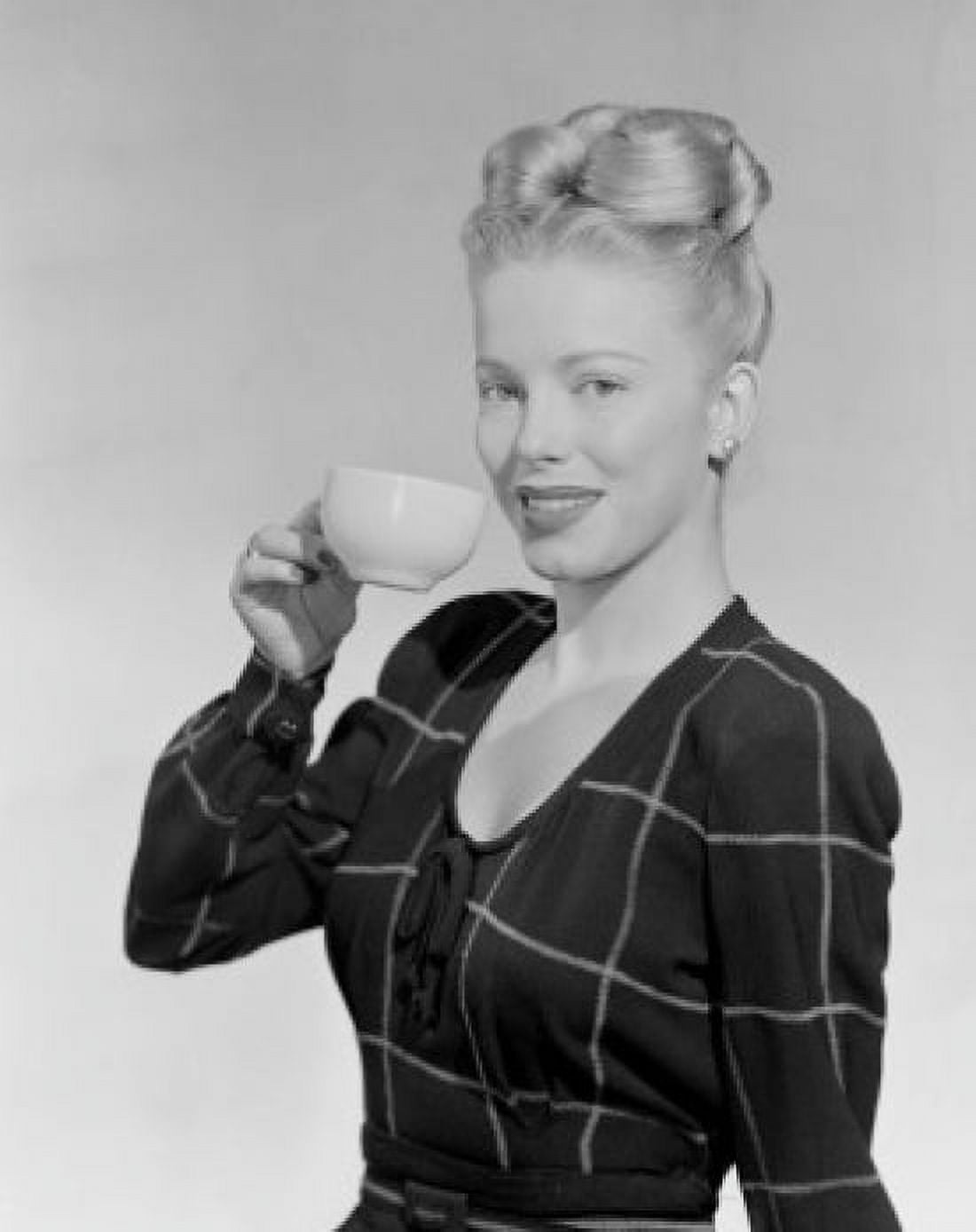 Portrait of woman holding coffee cup Canvas Art - (24 x 36)