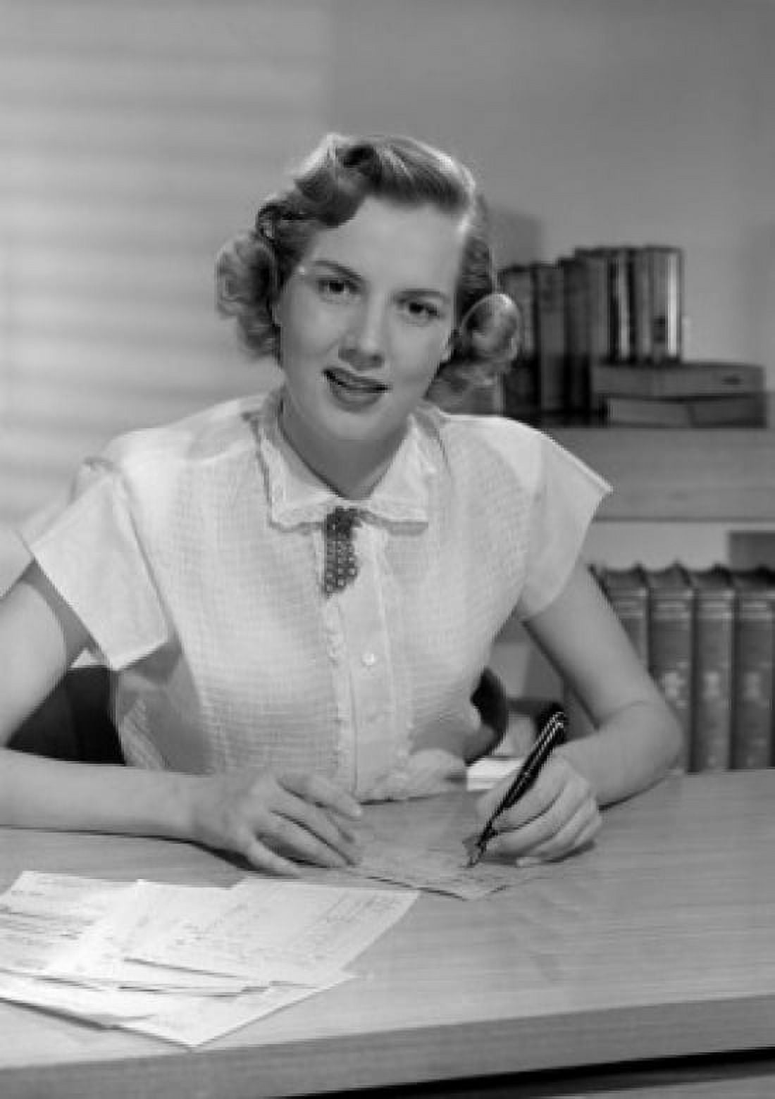 Portrait of woman sitting in office Canvas Art - (24 x 36)
