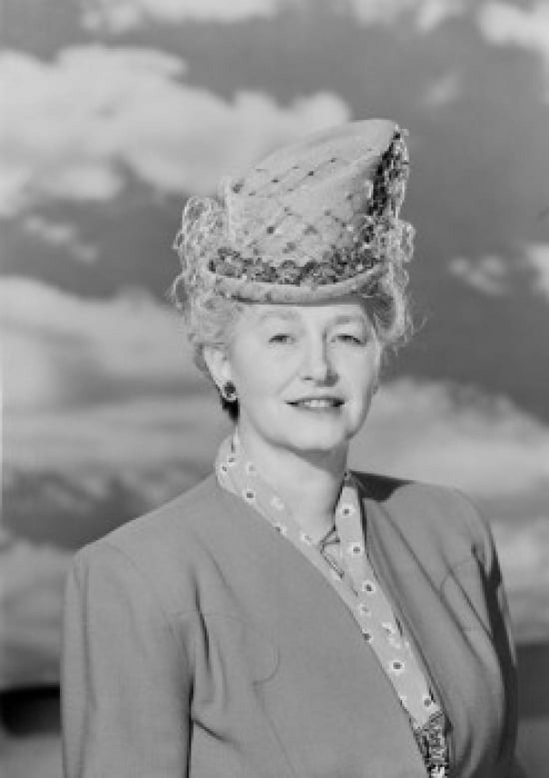 Portrait of woman wearing hat against cloudy sky Canvas Art -  (24 x 36)