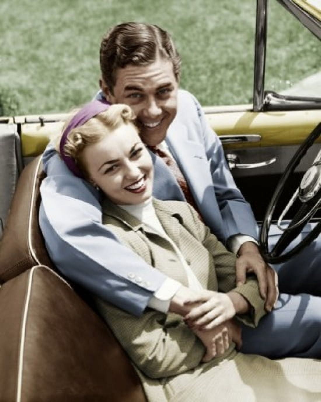 Portrait of young couple sitting in convertible car Canvas Art - (18 x 24)