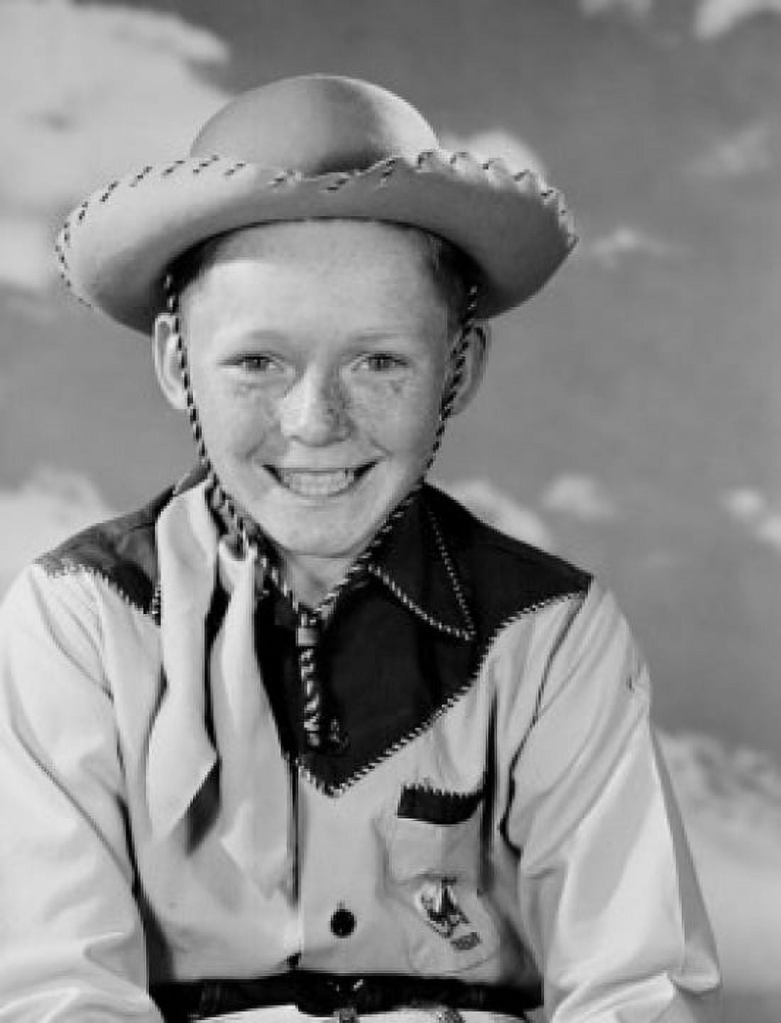 Portrait of young cowboy smiling Canvas Art - (24 x 36)