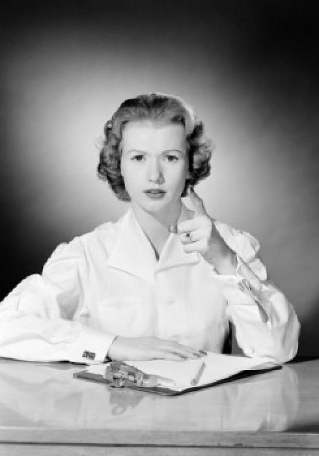 Portrait of young female office worker pointing towards camera Canvas Art - (18 x 24)