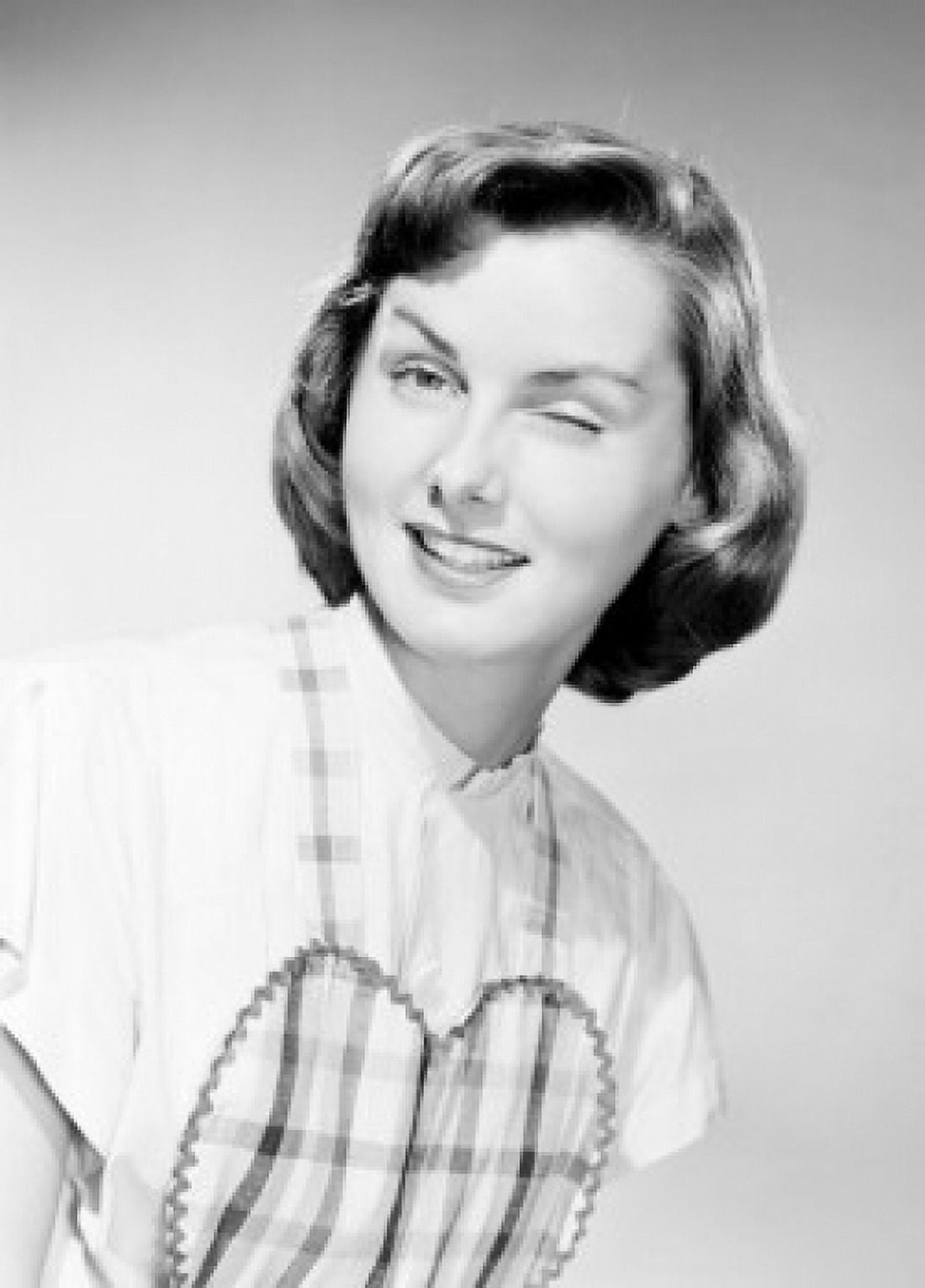Portrait of young housewife winking Canvas Art - (18 x 24)