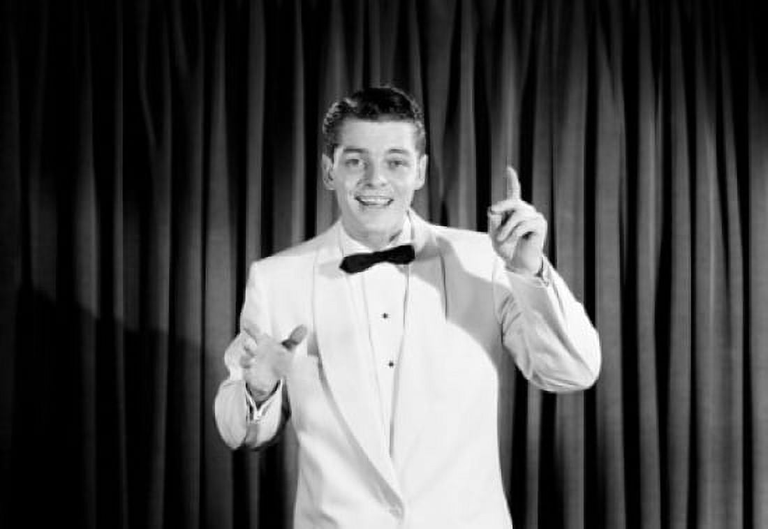 Portrait of young man on stage Canvas Art - (24 x 36)