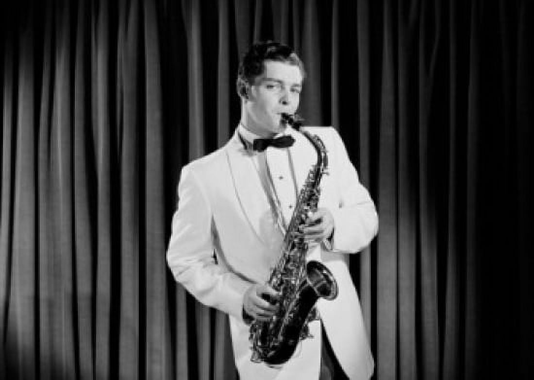 Portrait of young man playing saxophone on stage Canvas Art - (18 x 24)
