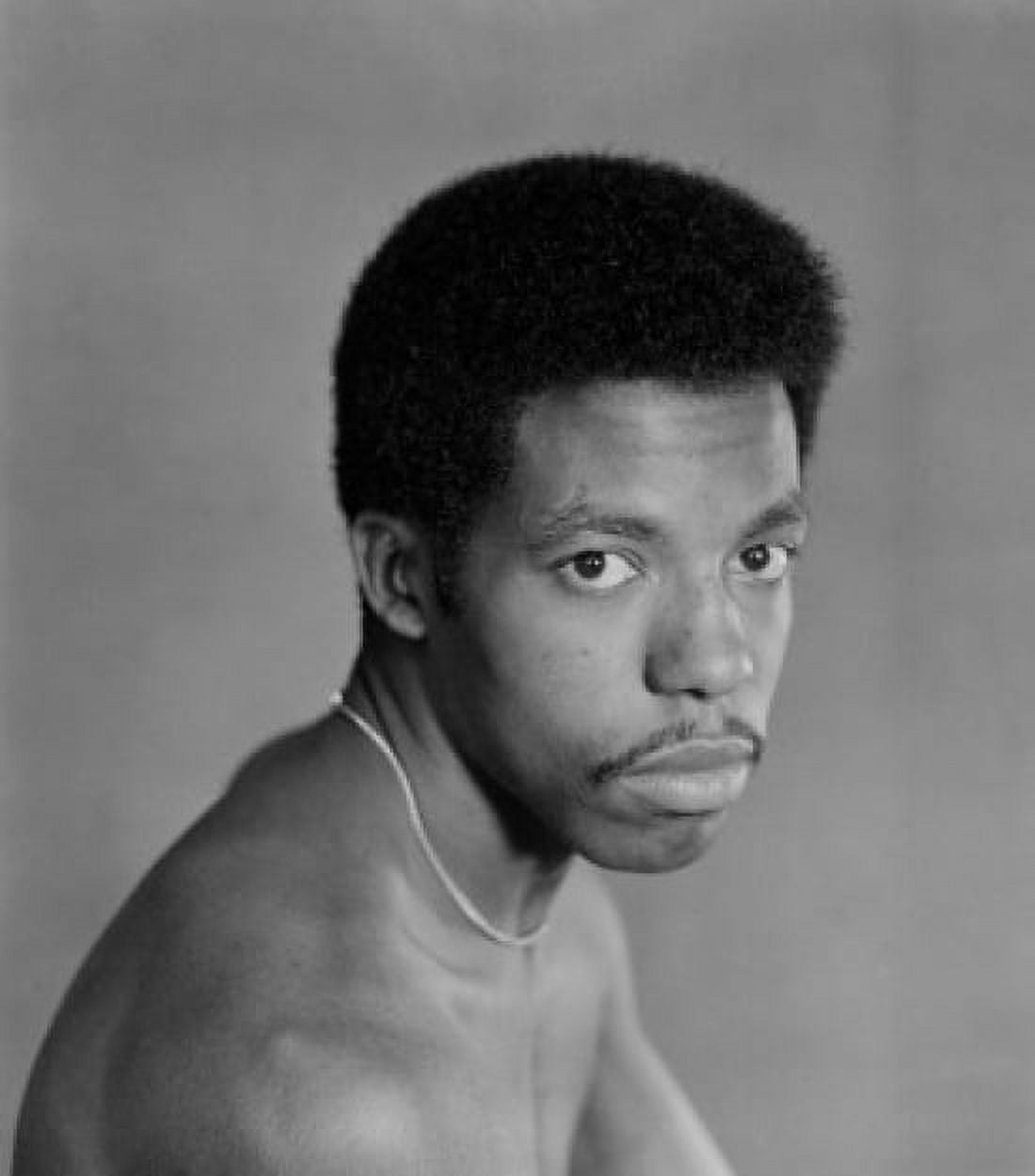 Portrait of young man with afro Canvas Art - (18 x 24)