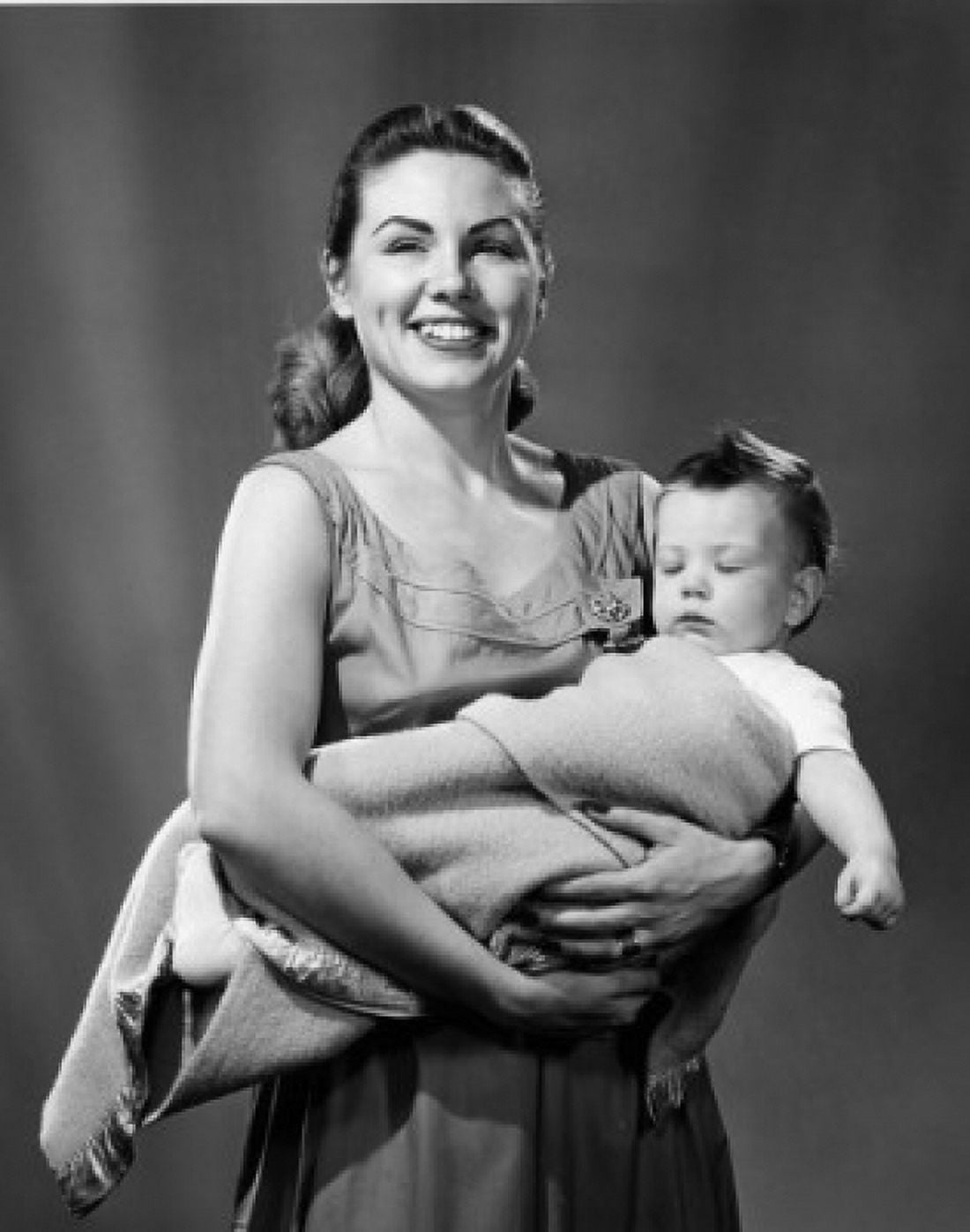 Portrait of young mother holding baby boy Canvas Art - (24 x 36)