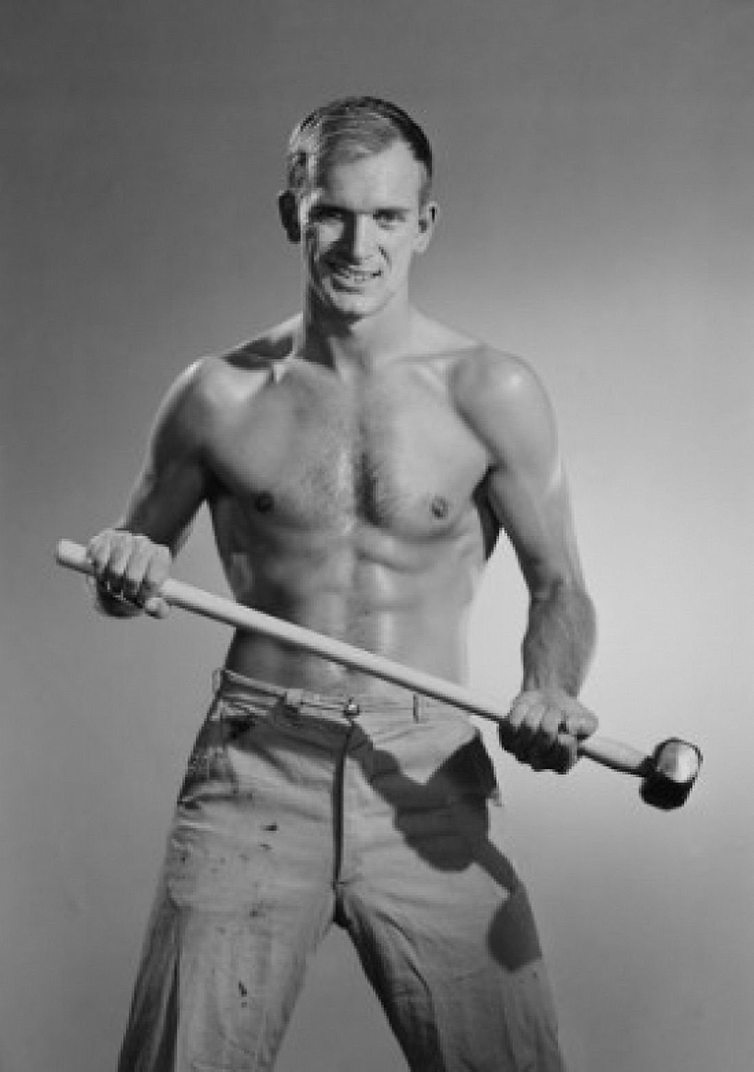 Portrait of young muscular man holding hammer Canvas Art - (24 x 36)