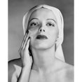thumbnail image 1 of Portrait of young woman applying cream to her face Poster Print (24 x 36), 1 of 4