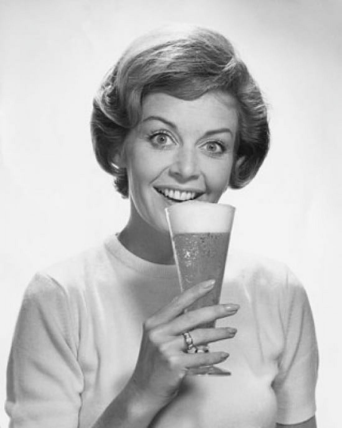 Portrait of young woman drinking beer Canvas Art - (18 x 24)