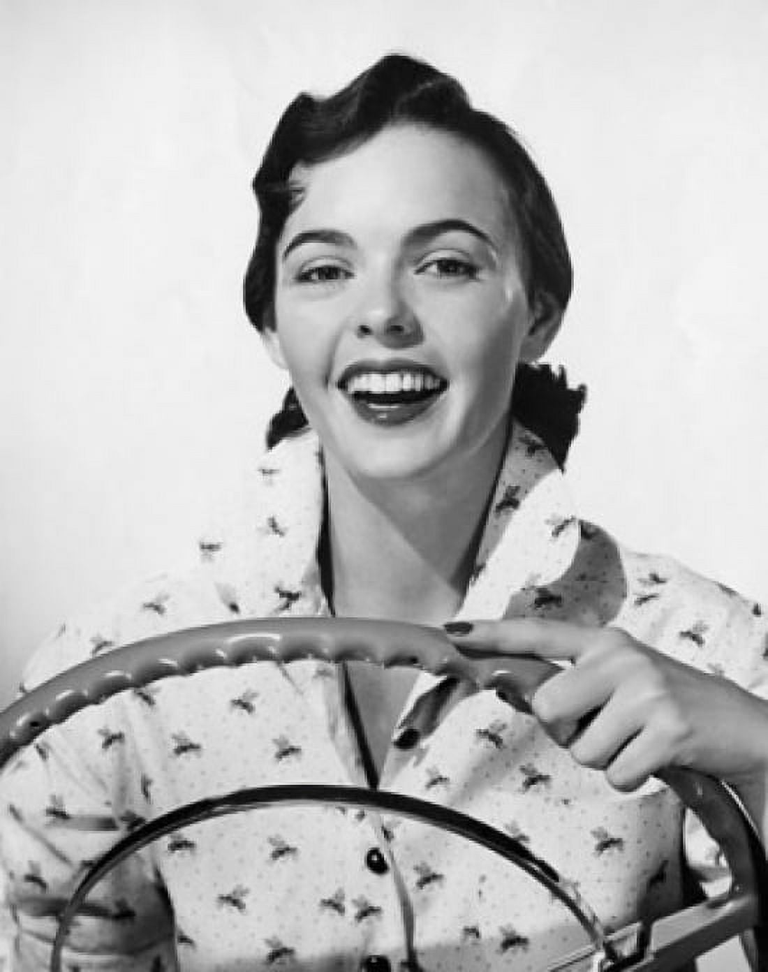 Portrait of young woman holding car steering wheel Canvas Art - (18 x 24)
