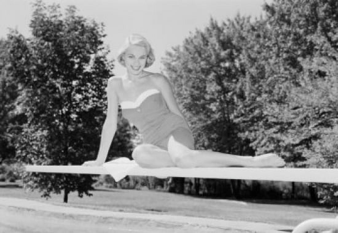 Portrait of young woman in swimming costume on diving board Canvas Art - (24 x 36)