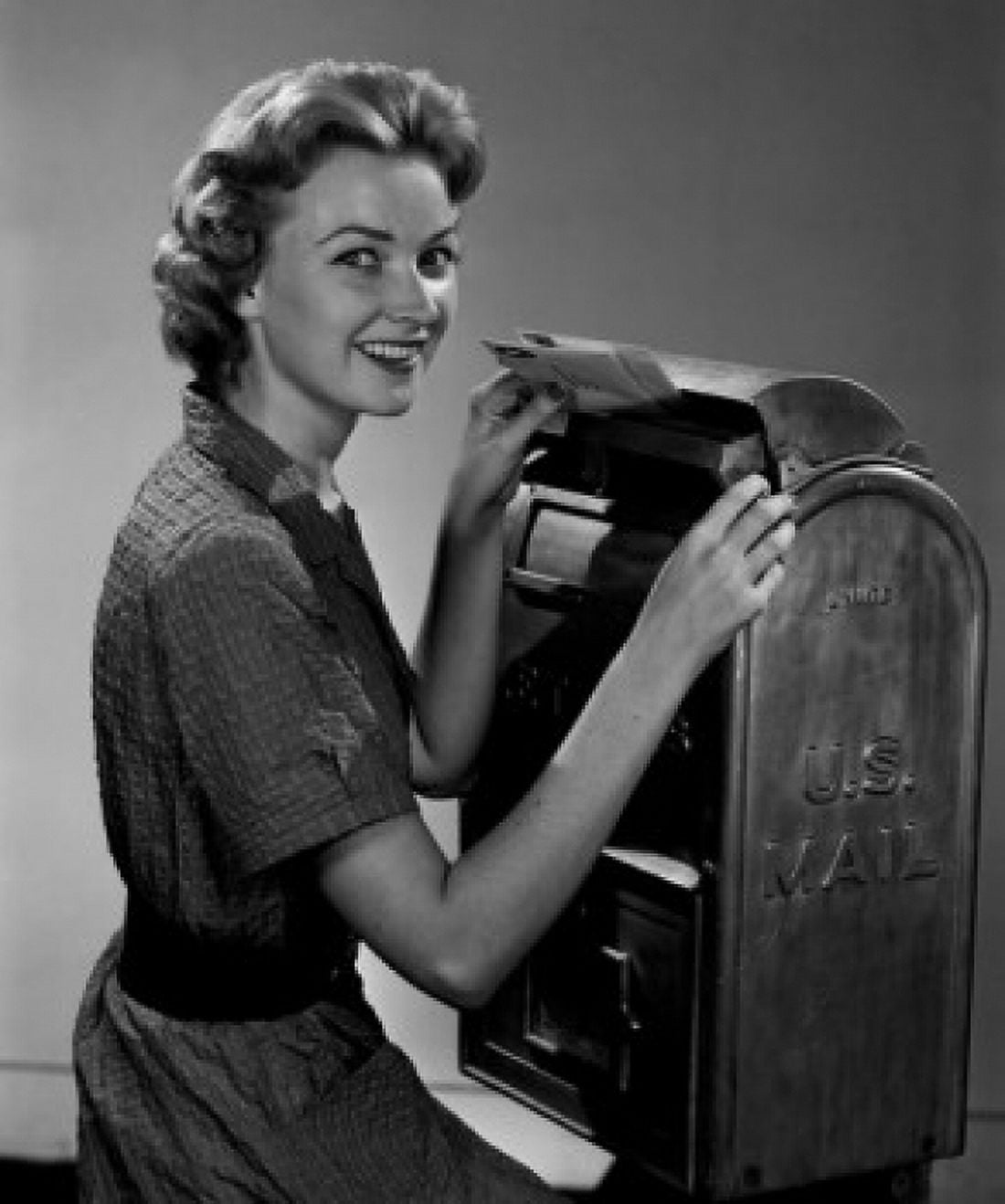 Portrait of young woman mailing letter Canvas Art - (24 x 36)