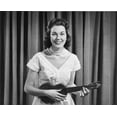 thumbnail image 1 of Portrait of young woman playing ukulele Poster Print (18 x 24), 1 of 1