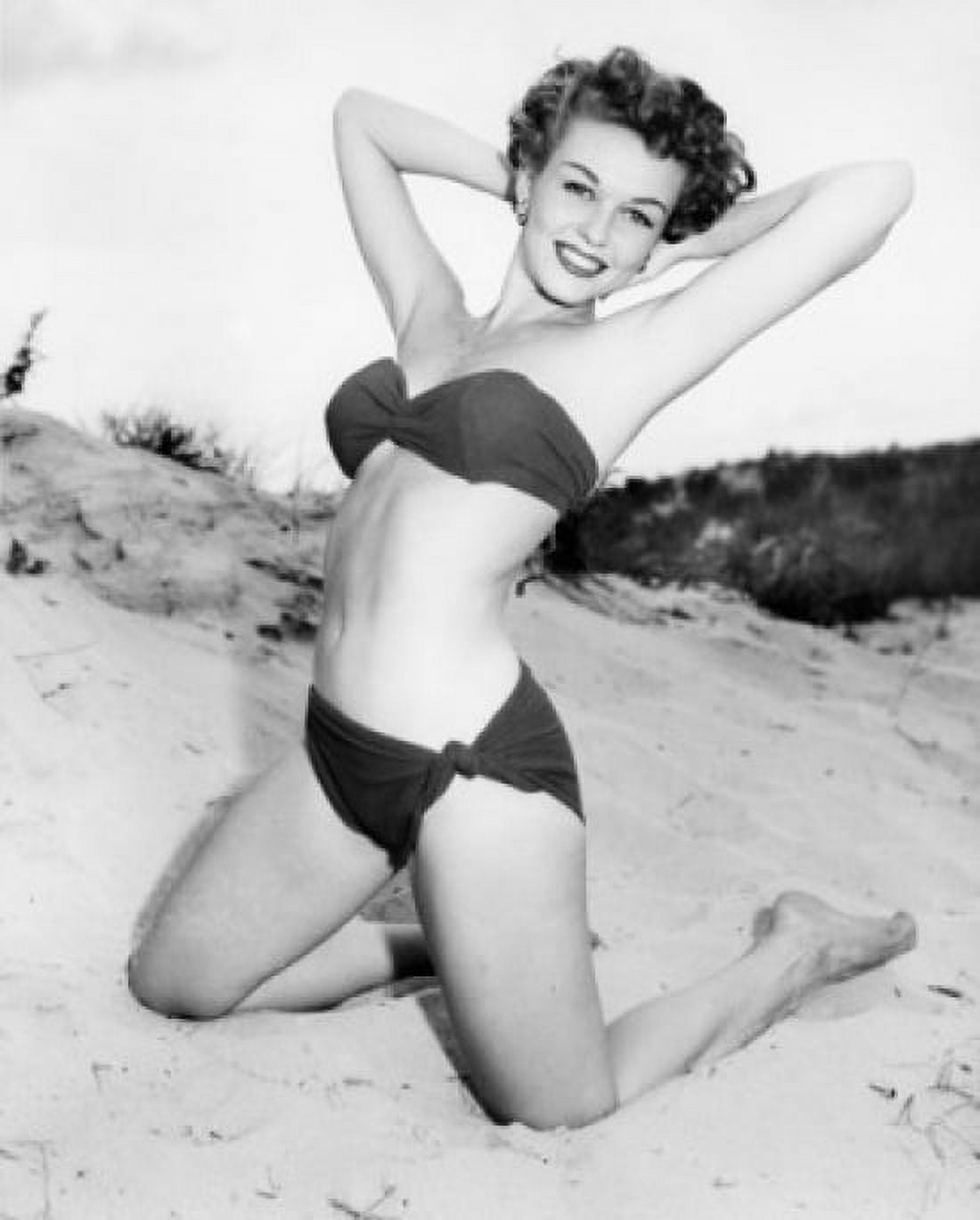 Portrait of young woman posing on beach Canvas Art - (24 x 36)