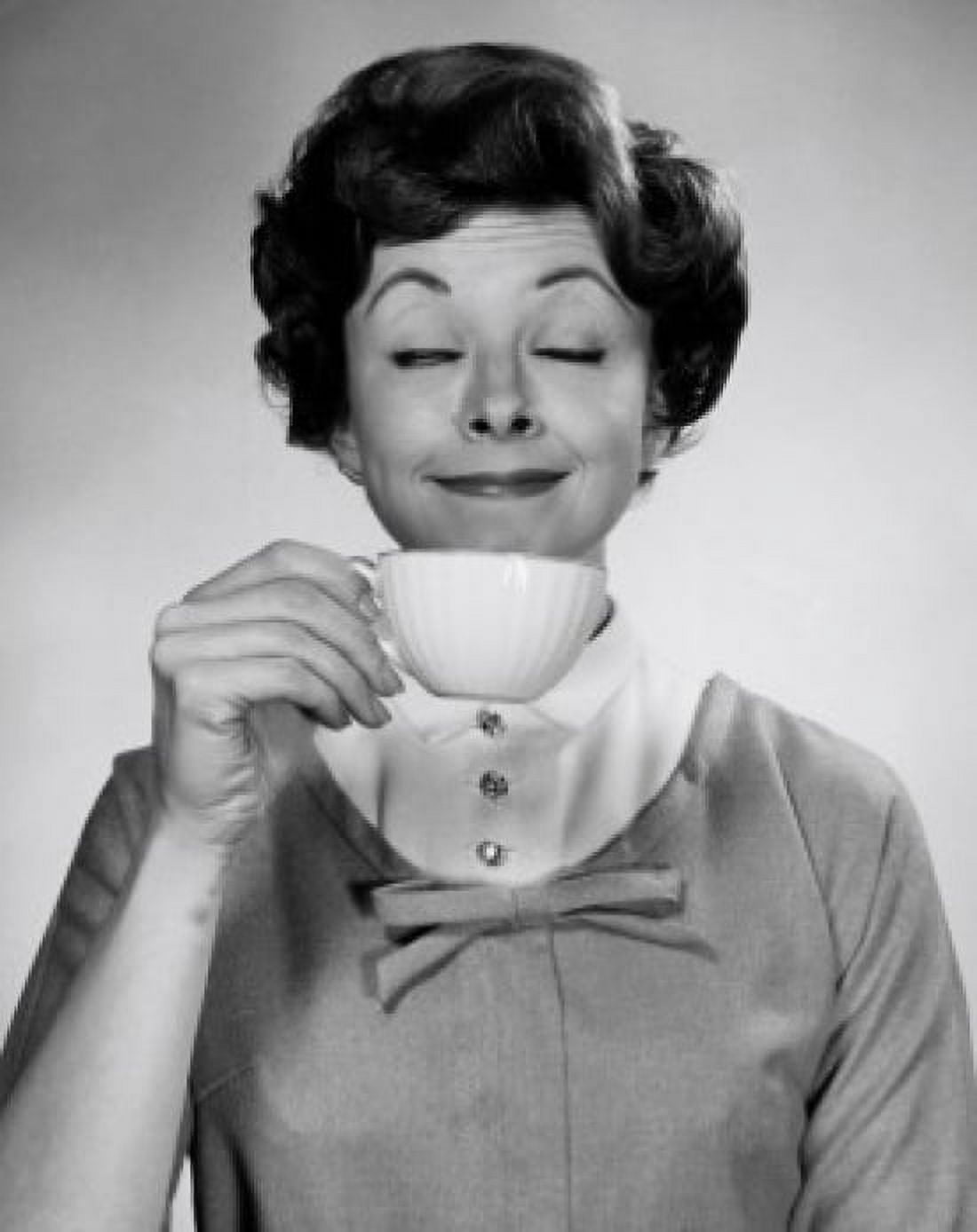 Portrait of young woman smelling cup of tea Canvas Art - (18 x 24)