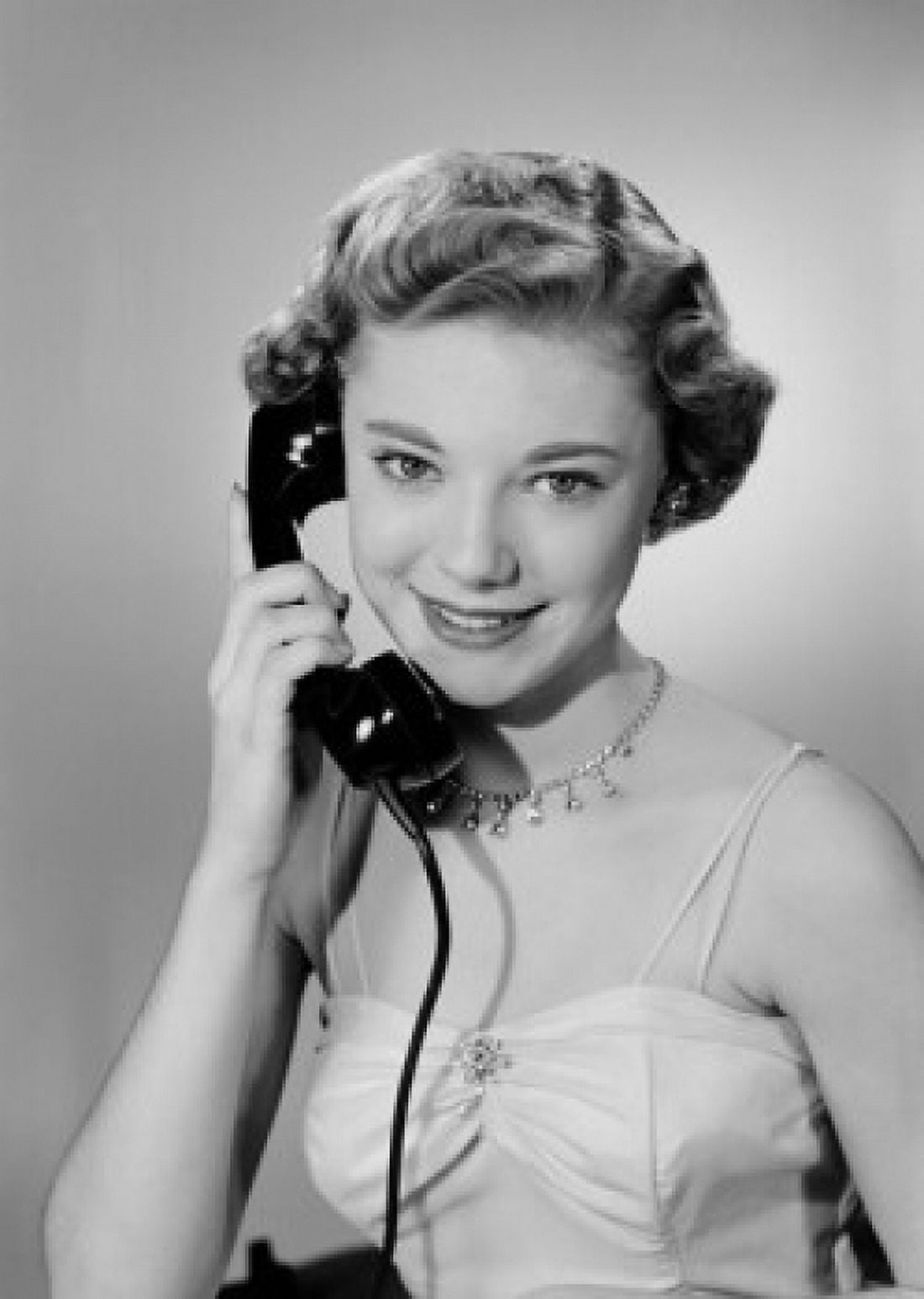 Portrait of young woman talking on phone Canvas Art - (24 x 36)