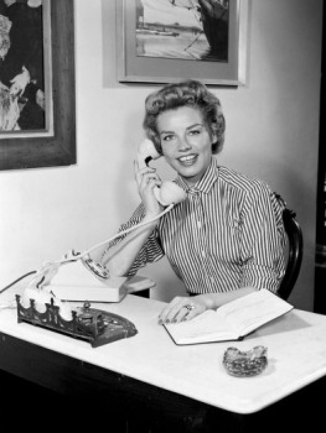 Portrait of young woman using telephone in office Canvas Art - (18 x 24)