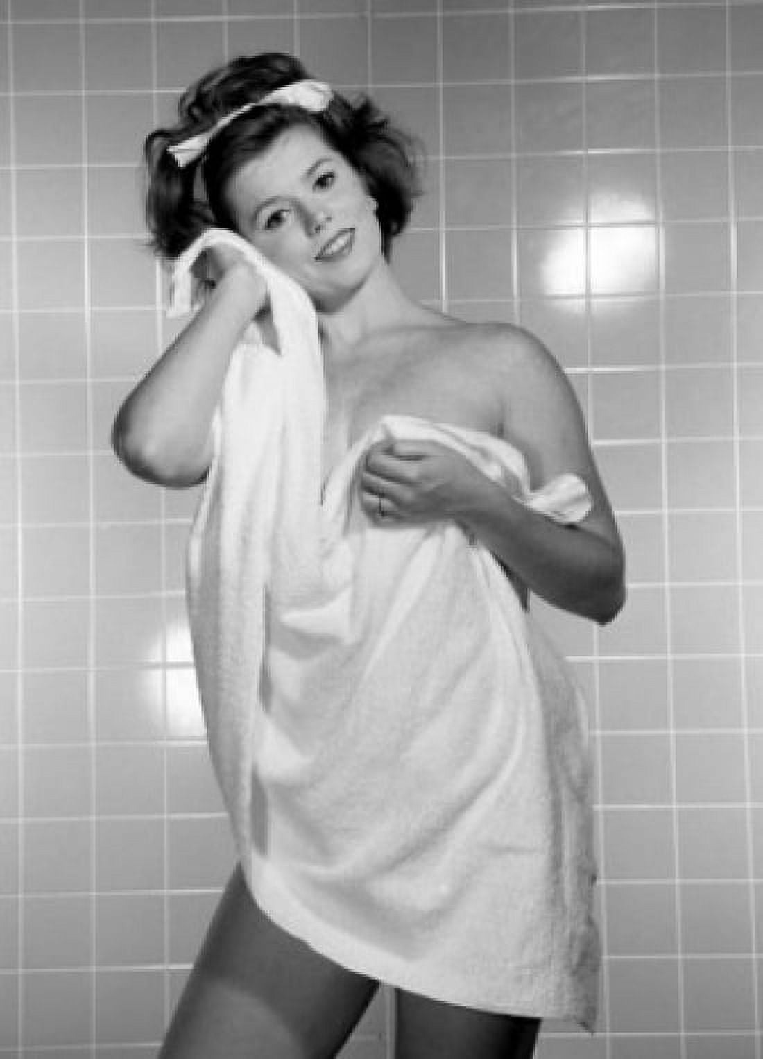 Portrait of young woman using towel in bathroom Canvas Art - (18 x 24)