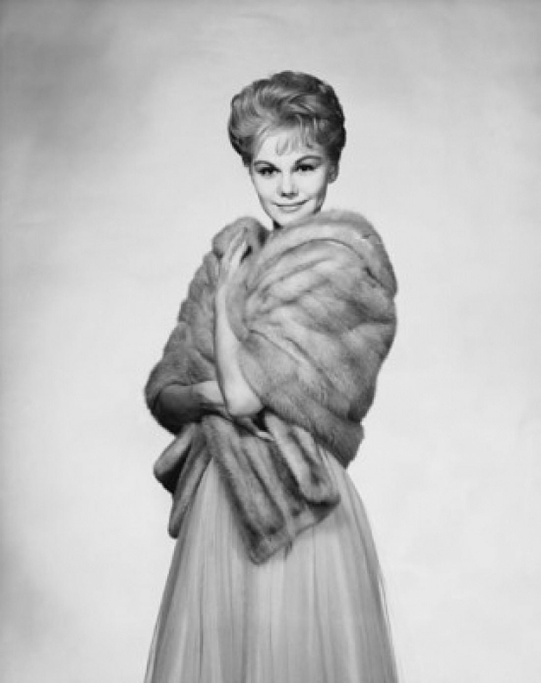 Portrait of young woman wearing fur shawl Canvas Art - (24 x 36)