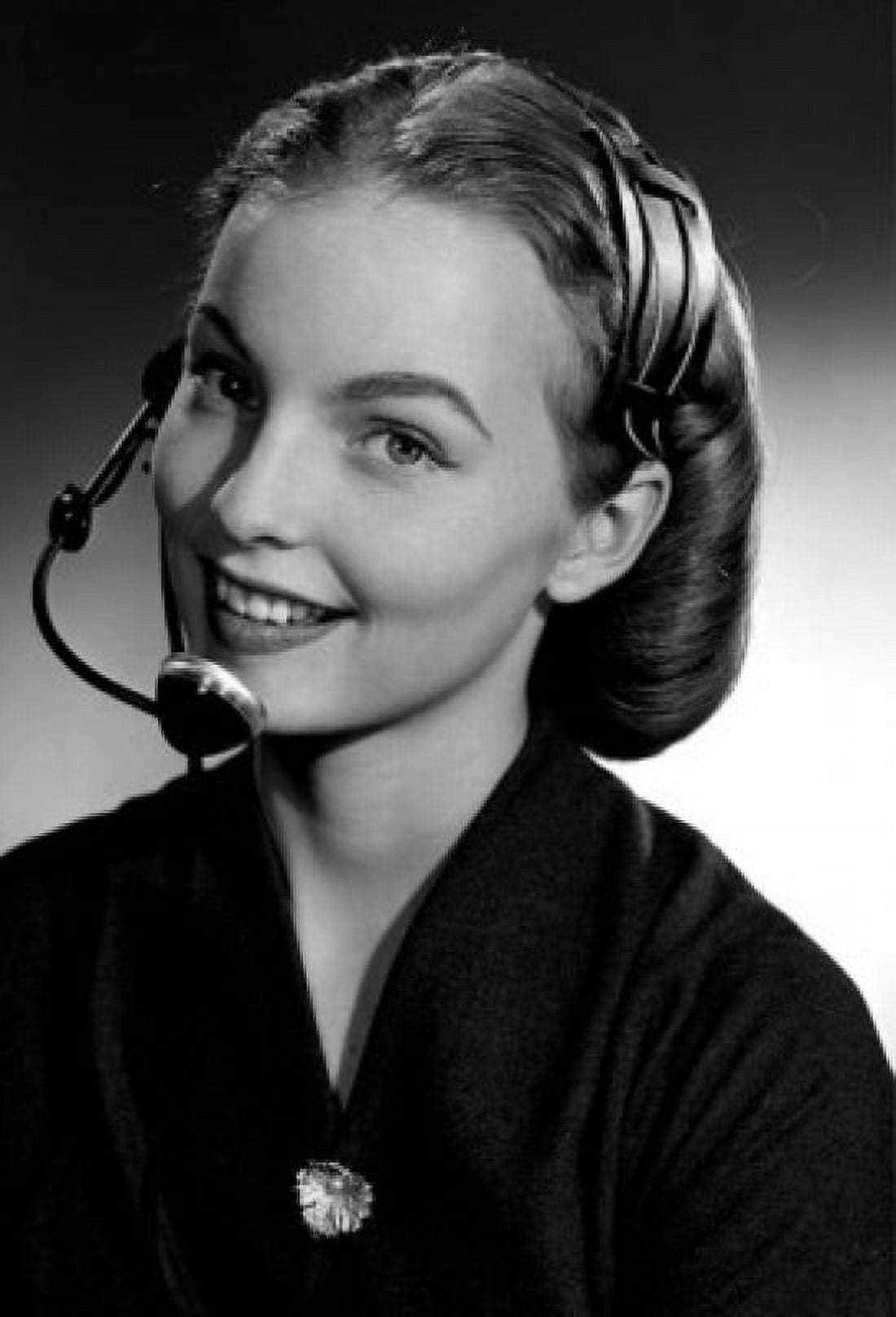 Portrait of young woman wearing headset Canvas Art - (24 x 36)