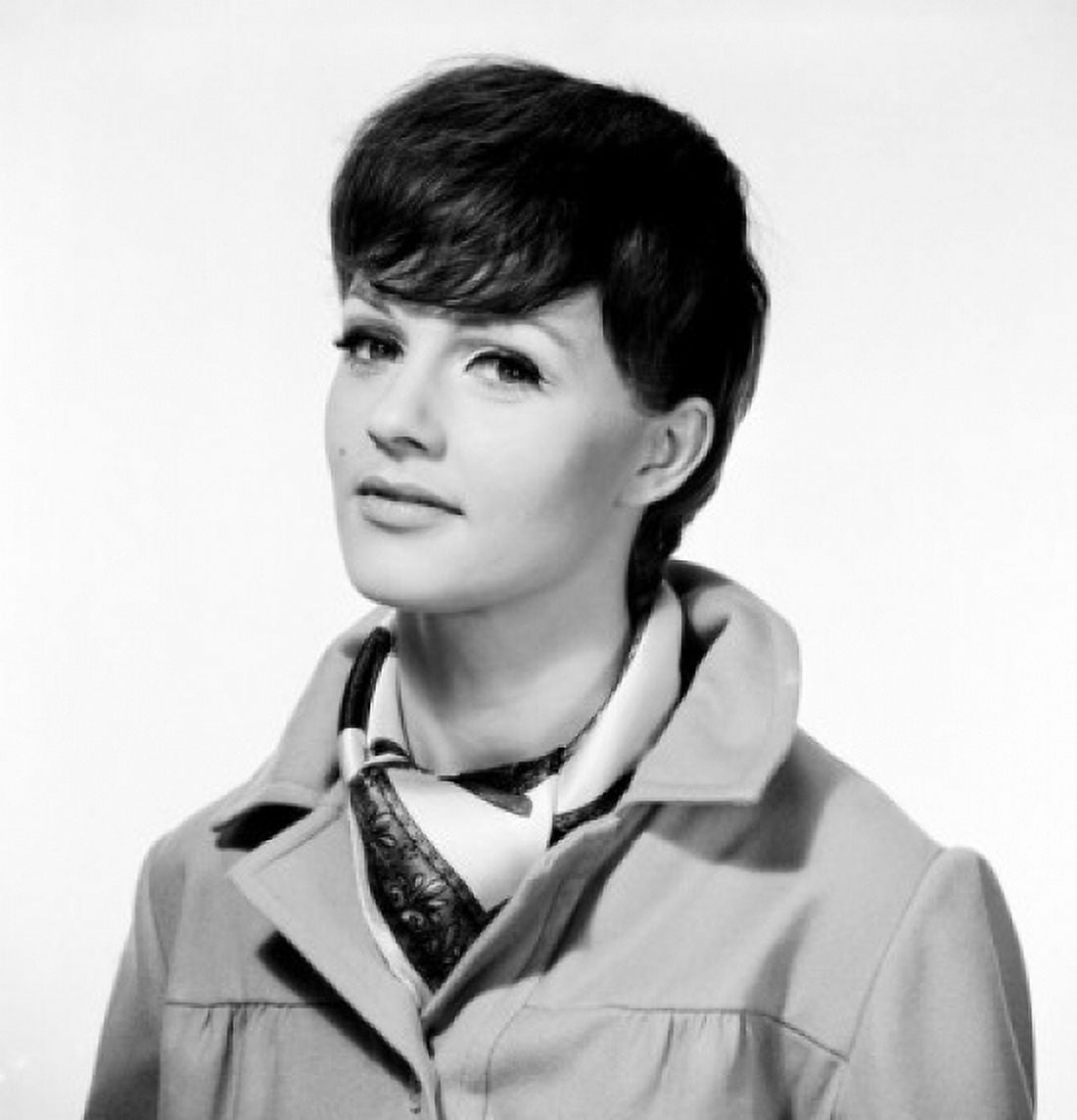 Portrait of young woman wearing overcoat Canvas Art - (18 x 24)