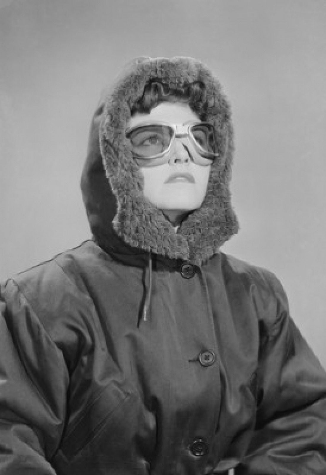Portrait of young woman wearing sunglasses and anorak Canvas Art - (18 x 24)