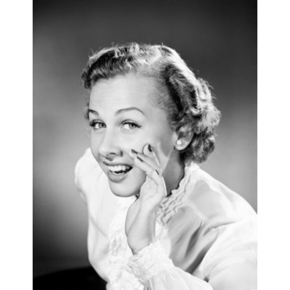 Portrait of young woman whispering Poster Print (24 x 36)