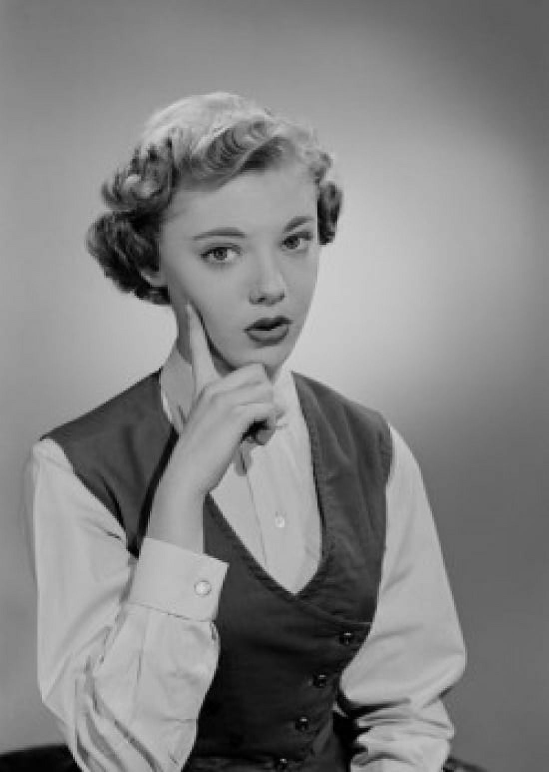 Portrait of young woman with hand on chin Canvas Art - (24 x 36)