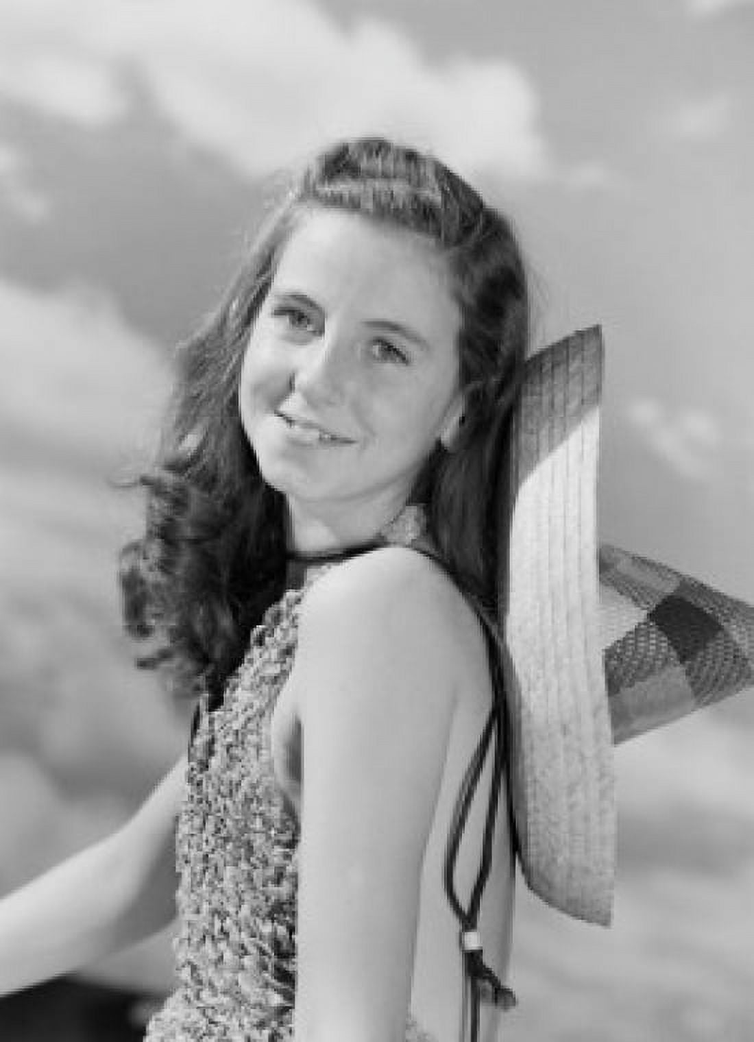 Portrait of young woman with sombrero against cloudy sky Canvas Art - (18 x 24)