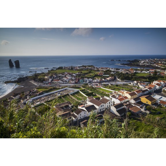 Portugal Azores Sao Miguel Island Mosteiros. Elevated town view Poster Print by Walter Bibikow