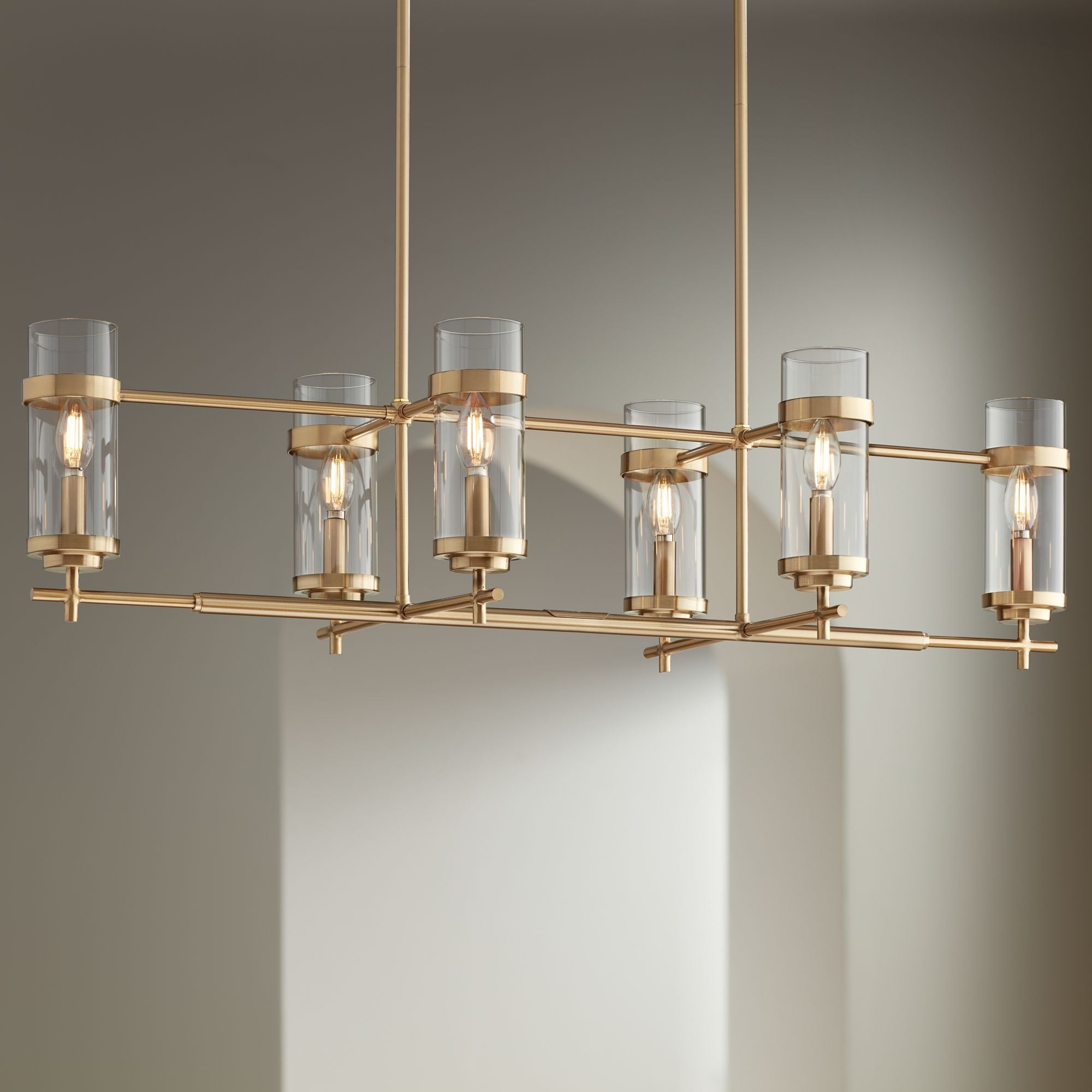 Soft Gold Linear Island Pendant with Clear Glass Shades