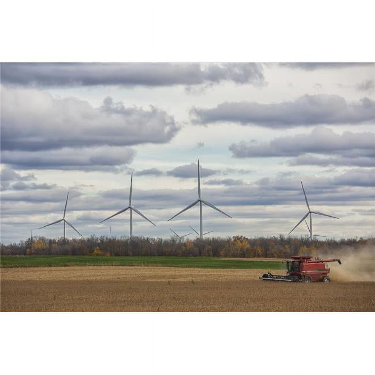 Posterazzi A Combine Harvests Soybeans While Wind Turbines Spin in The